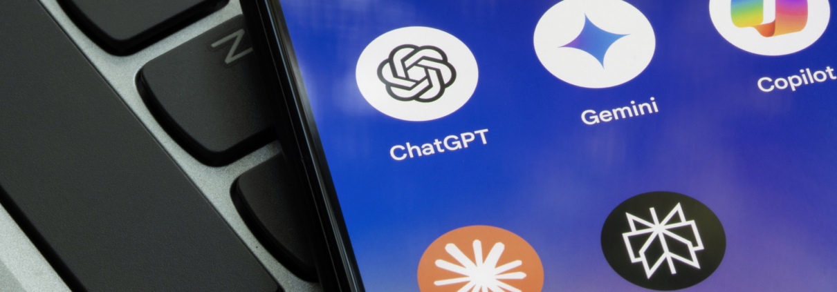 Photo of smart phone home screen with app icons for ChatGPT, Gemini, Copilot, Claude and Perplexity
