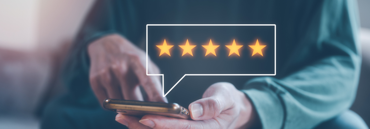Person giving a five star review on a cell phone